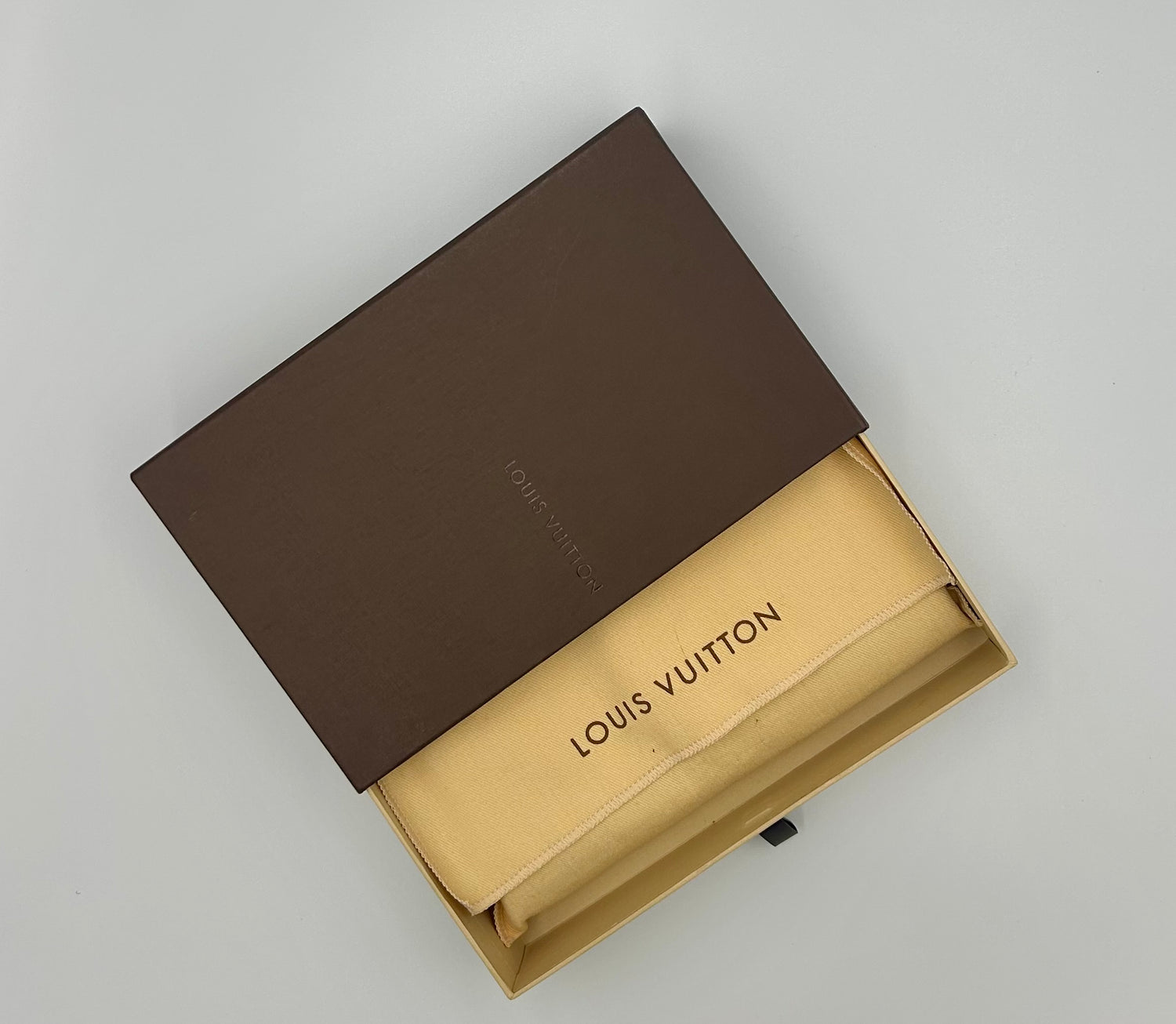 Louis Vuitton Black Mahina Leather Amelia Wallet with Push Lock Closure